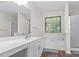 Bright bathroom featuring a soaking tub and separate shower at 26 Springbottom Dr, Lawrenceville, GA 30046