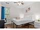 This bedroom features vinyl flooring, neutral walls, and a double-hung window at 26 Springbottom Dr, Lawrenceville, GA 30046