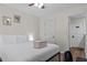 Bright bedroom with soft natural light, vinyl floor and closet access to an adjoining room at 26 Springbottom Dr, Lawrenceville, GA 30046