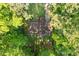 Overhead aerial view of a cozy home surrounded by lush greenery, creating a private and serene setting at 2856 Bay Leaf Se Dr, Conyers, GA 30094