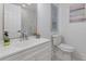 Bathroom featuring a white vanity, and a large mirror, offering a clean and bright space at 2856 Bay Leaf Se Dr, Conyers, GA 30094