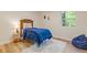 Comfortable bedroom with a bed, beanbag chair and window offering natural light at 2856 Bay Leaf Se Dr, Conyers, GA 30094
