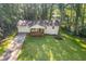 Inviting home with a well-kept lawn and a cozy front porch, creating a warm and welcoming atmosphere at 2856 Bay Leaf Se Dr, Conyers, GA 30094