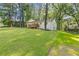 Charming home with a spacious yard and a wooden deck, perfect for enjoying the outdoors at 2856 Bay Leaf Se Dr, Conyers, GA 30094