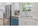 Stylish kitchen with sleek stainless steel appliances, modern white cabinetry, and an inviting atmosphere for meal preparation at 2856 Bay Leaf Se Dr, Conyers, GA 30094