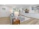 Bright and inviting living room with hardwood floors, a cozy fireplace, and ample natural light from large windows at 2856 Bay Leaf Se Dr, Conyers, GA 30094