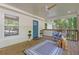 Inviting covered porch with comfortable seating and stylish decor, perfect for relaxation and enjoying the outdoor views at 2856 Bay Leaf Se Dr, Conyers, GA 30094