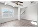 Bright office space with coffered ceiling, wainscoting, and large window allowing for natural light at 33 N Village Cir, Rydal, GA 30171
