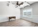 Home office space with coffered ceilings, wainscoting, and a large window for natural light at 33 N Village Cir, Rydal, GA 30171