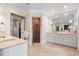 Spacious bathroom features a walk-in shower, tile flooring, dual sinks and vanity at 122 Old Ivy Ne Rd # 17, Atlanta, GA 30342