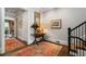 Traditional foyer featuring hardwood floors, elegant decor, and access to other rooms in the home at 122 Old Ivy Ne Rd # 17, Atlanta, GA 30342