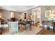 Spacious living room showcasing hardwood floors, classic decor, and seamlessly connects to other rooms at 122 Old Ivy Ne Rd # 17, Atlanta, GA 30342