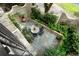 Charming brick patio featuring beautiful landscaping and outdoor dining area at 122 Old Ivy Ne Rd # 17, Atlanta, GA 30342