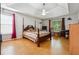 Bedroom featuring two windows and a ceiling fan at 1921 Flint Hill Dr, Lawrenceville, GA 30044