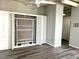 Bright bedroom with built-in murphy bed, storage and overhead fan at 20 Marietta Nw St # 7C, Atlanta, GA 30303