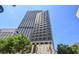 High-rise building featuring a modern facade and a blue sky at 20 Marietta Nw St # 7C, Atlanta, GA 30303