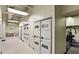 Community laundry room with rows of modern washers and dryers at 20 Marietta Nw St # 7C, Atlanta, GA 30303