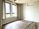 Bright living room featuring large windows and sleek flooring at 20 Marietta Nw St # 7C, Atlanta, GA 30303