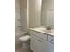 Bathroom with tile floor, toilet, and vanity with white cabinets at 3706 Cheswolde Ave # 96, Powder Springs, GA 30127