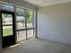 A screened-in patio offers an inviting view of the outdoors for relaxation and leisure activities at 3706 Cheswolde Ave # 96, Powder Springs, GA 30127