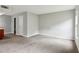 The living room is painted in neutral tones with two windows for natural lighting at 721 Beaufort Cir, Duluth, GA 30096