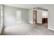 Living room with access to a patio and an entrance to the kitchen at 721 Beaufort Cir, Duluth, GA 30096