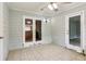 Spacious sunroom with tile flooring and neutral paint at 721 Beaufort Cir, Duluth, GA 30096