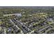 This aerial view shows a residential neighborhood with green trees and a school with multiple athletic fields at 78 Crumley Se St, Atlanta, GA 30312