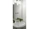 Clean, well-lit powder room features a modern sink, stylish fixtures, and decorative greenery at 78 Crumley Se St, Atlanta, GA 30312
