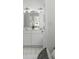 Elegant bathroom featuring double sinks, white cabinets, and bright lighting at 78 Crumley Se St, Atlanta, GA 30312