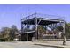 Summerhill Avenue building with an elevated metal platform and musical mural with neighborhood references at 78 Crumley Se St, Atlanta, GA 30312