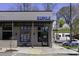 Meeples restaurant with a sleek brick exterior, outdoor seating, and ample parking at 78 Crumley Se St, Atlanta, GA 30312