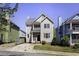 Charming two-story home featuring a classic design, well-maintained lawn, and inviting curb appeal on a sunny day at 78 Crumley Se St, Atlanta, GA 30312