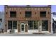 Halfway Crooks Brewery features a vintage brick exterior, large windows, and a welcoming doorway at 78 Crumley Se St, Atlanta, GA 30312