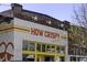 How Crispy Express with painted brick, bright sunny windows, and urban storefront at 78 Crumley Se St, Atlanta, GA 30312