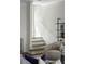 Bright entryway showcasing a staircase, light and airy design, and decorative shelving at 78 Crumley Se St, Atlanta, GA 30312