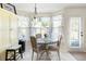 Cozy breakfast nook with large windows providing ample natural light and a view of the outdoors at 102 Autumn Brooke Trl, Dallas, GA 30157