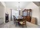 Dining room featuring hardwood floors, a wooden dining table, and a china cabinet at 102 Autumn Brooke Trl, Dallas, GA 30157