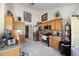 Bright kitchen featuring wooden cabinetry, stainless steel appliances, and tile backsplash at 102 Autumn Brooke Trl, Dallas, GA 30157