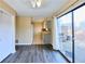 Inviting dining area with modern flooring, great light, and access to the patio at 1606 Parkaire Xing # 1606, Marietta, GA 30068