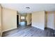 Open-concept living room featuring new floors and neutral paint at 1606 Parkaire Xing # 1606, Marietta, GA 30068