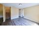 Open-concept living room featuring new floors and plenty of natural light at 1606 Parkaire Xing # 1606, Marietta, GA 30068