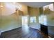 Spacious living room showcasing tall ceilings, fireplace, and modern floors at 1606 Parkaire Xing # 1606, Marietta, GA 30068