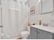 Cozy bathroom features a vanity, toilet, tub, and shower at 561 Sybil Se Ln, Marietta, GA 30067
