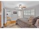 Bright bedroom features hardwood floors and ensuite bathroom at 561 Sybil Se Ln, Marietta, GA 30067