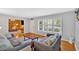 Bright living room featuring hardwood floors and a large window for plenty of natural light at 561 Sybil Se Ln, Marietta, GA 30067