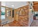 Charming sunroom featuring brickwork and an entryway at 561 Sybil Se Ln, Marietta, GA 30067