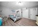 Charming bedroom featuring modern decor, stylish bedding, and plenty of closet space at 7401 Cherry Blossom Way, Winston, GA 30187