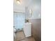 Bathroom with a sink vanity, stylish shower curtain, and modern fixtures at 1591 Jonesboro Se Rd, Atlanta, GA 30315