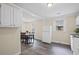 Charming kitchen and dining area with wood floors, bright windows, and classic appliances at 1591 Jonesboro Se Rd, Atlanta, GA 30315